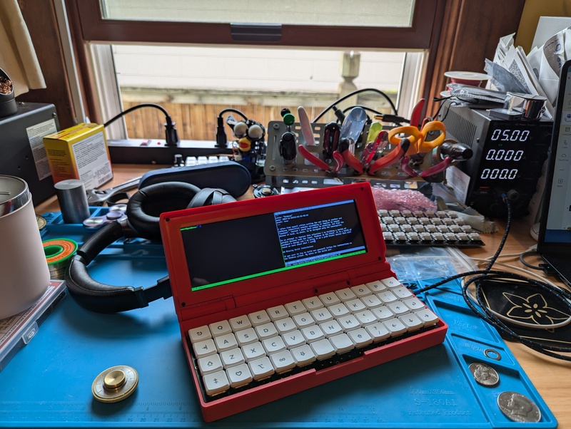 Penkesu hobby computer sitting on desk.